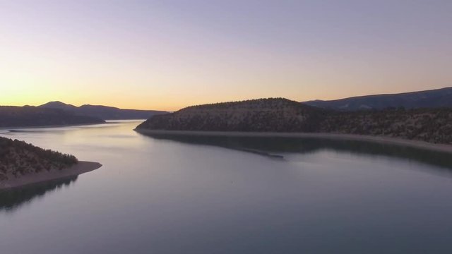 Mostly Vertical flight over a Colorado Rocky Mountain Lake with a tough of a zoom out towards the end.