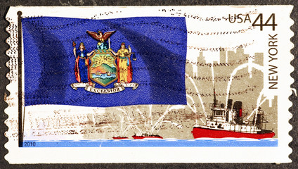 Flag of New York state on US postage stamp