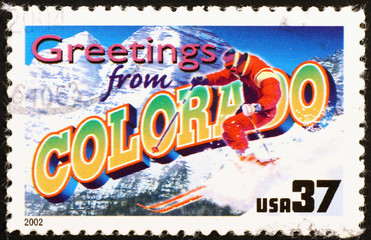 Greetings from Colorado postcard on stamp