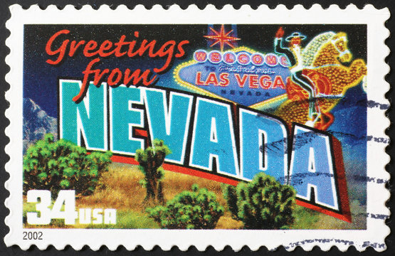 Greetings from Nevada postcard on stamp