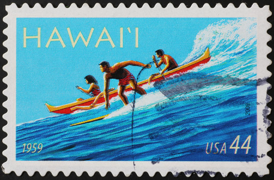 Stamp representing surfer & canoe in Hawaii islands