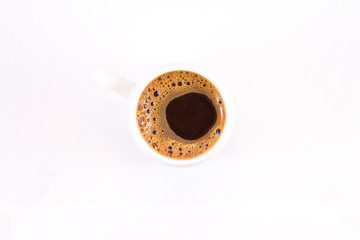 Cup of coffee on a bright background of white.