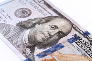 Portrait of Franklin on hundred-dollar bill. Close-up. Selective focus.
