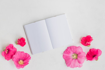 Mockup notebook with pink flowers