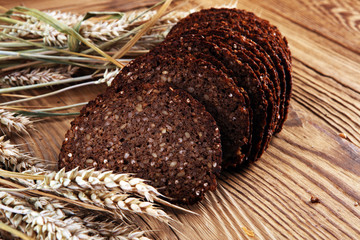bread on wooden board from above. Kitchen or bakery poster design.