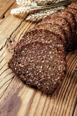 bread on wooden board from above. Kitchen or bakery poster design.