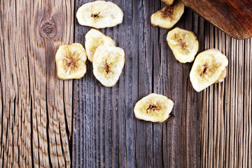 Obraz na płótnie Canvas Banana chips, dehydrated slices of fresh ripe bananas.