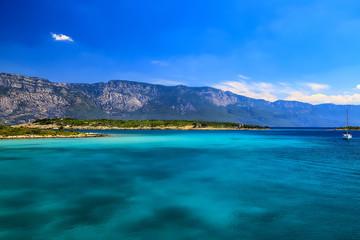 The picturesque Gekova gulf in the Aegean Sea - clear turquoise water  against the backdrop of the...