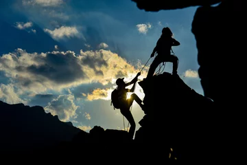 Selbstklebende Fototapete Bergsteigen echte Kampfsportler und Erfolge erzielen