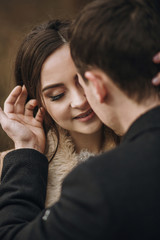 sensual bride and groom embracing in autumn forest. happy newlywed couple hugging in woods, romantic tender moment of gorgeous wedding couple