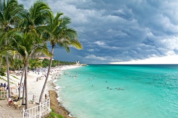 A tropical storm is approaching a touristic hotel beach in Varadero, Cuba