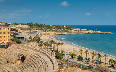 Fototapeta premium Panoramic view of the ancient roman amphitheater of Tarragona, Spain, next to the Mediterranean sea - UNESCO World Heritage Site