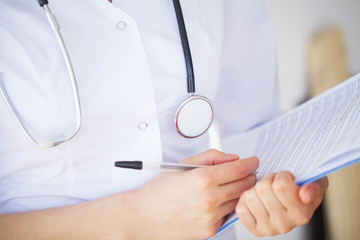 Doctor Woman With Stethoscope In Hospital. Concept Of The Global Healthcare And Medicine