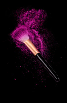 make-up brush with powder dust