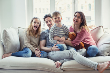 happy family,dad,mom, sister and brother