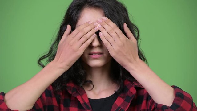 Young beautiful businesswoman showing three wise monkeys concept