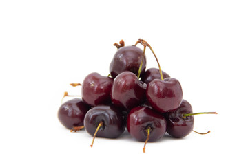 A hill of sweet cherry isolated on white background
