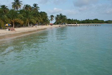 View of the cayo and the ocean against a blue sky in Morrocoy National Park.