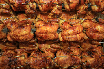 Chickens roasting in Rotisserie in Germany. Europe