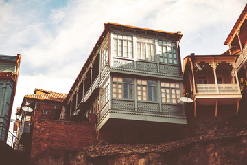 Old sulfur Baths in Abanotubani district with wooden carved balconies in the Old Town of Tbilisi Georgia.