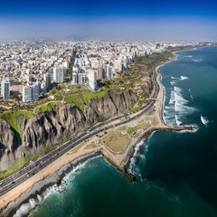 LIMA, PERU: Aerial view of Miraflores town, cliff and the Costa Verde high way. - obrazy, fototapety, plakaty