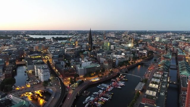Aerial drone view of Hamburg Hafencity and harbor in beautiful evening light. View of the Speicherstadt and city skyline.