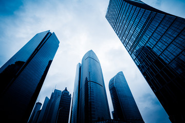 Architecture details Modern Building Glass facade Business background.