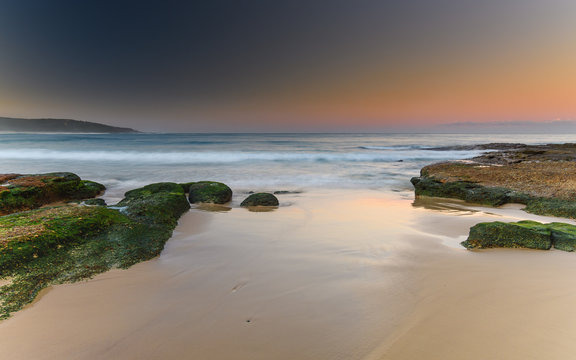Sunset Seascape and Beach Rocks