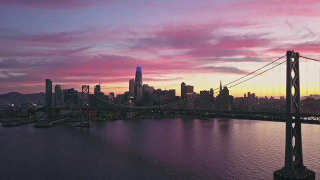 Aerial cityscape video of San Francisco skyline at sunset