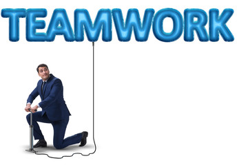 Businessman pumping promotion in business concept