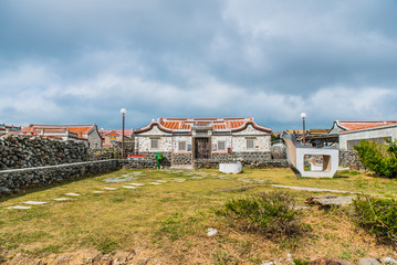 Traditional Chinese stone building with garden