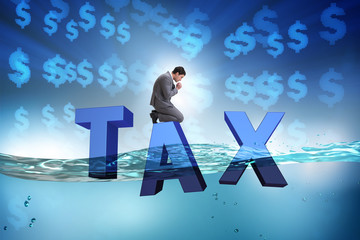 Businessman having problems with paying taxes