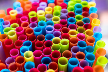 Drinking straws colorful coming together.