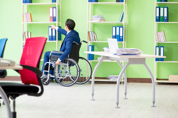 Disabled businessman working in the office