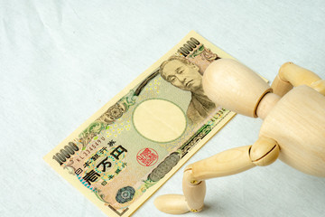 お金とマネキン