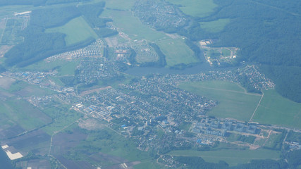 Fototapeta na wymiar view of the city through window of an airplane