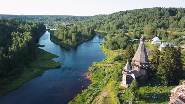 Top view of the Church of St. Nicholas (built 1696) in Soginicy village. Green forests of Leningrad region and Republic of Karelia, Russia.