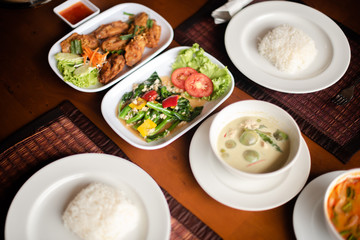 Dinner set of local Thai style with assorted fried vegetable and hot soup, chicken grill and curry hot chilli, rice main menu