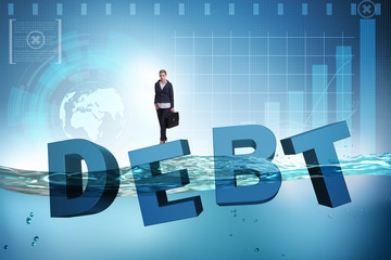 Businesswoman in debt business concept
