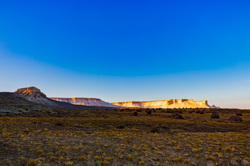 The stunning views of the chalk cliffs and round rocks at eary morning in Naizatau, Mangystau, Kazakhstan