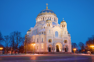 Fototapeta na wymiar St. Nicholas naval Cathedral in night illumination on March evening. Kronstadt, Russia