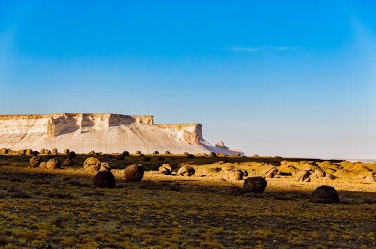 The stunning views of the chalk cliffs and round rocks at eary morning in Naizatau, Mangystau, Kazakhstan