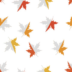 Vector seamless pattern with red, yellow and orange maple leaves. Colors of autumn nature for your design.