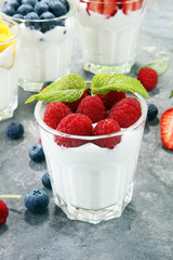 Yogurt and berry. Fresh fruit yogurt with fresh berries and peaches