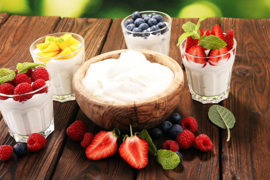 Yogurt and berry. Fresh fruit yogurt with fresh berries and peaches
