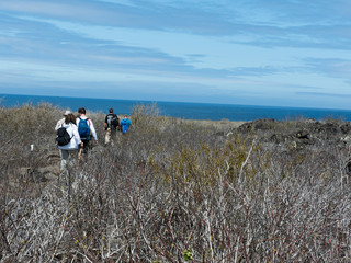 Tour group walking on Galapagos Islands