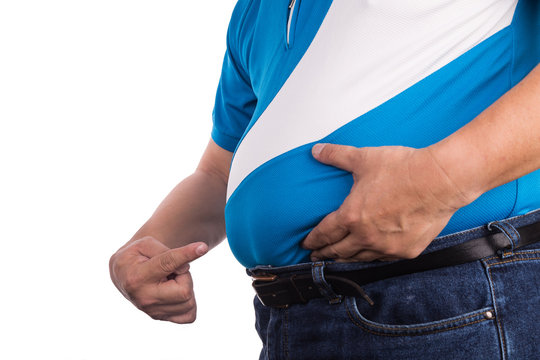 Man pointing own unhealthy big belly with visceral subcutaneous fats