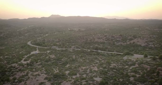 Overhead view of a road running through the Sonoran Desert in Arizona