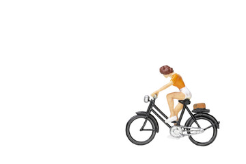 Fototapeta na wymiar Miniature people travellers with bicycle isolate on white background with clipping path.