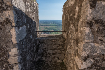 Wallpaper background of landscape view from an antique stone wall in a medieval town. Sermoneta. Italy. No people.